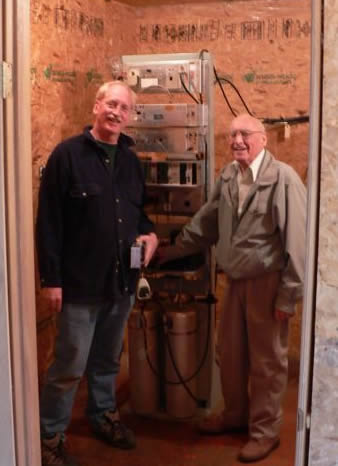 Dave finishing a repair to the Athabasca repeater wilth Les